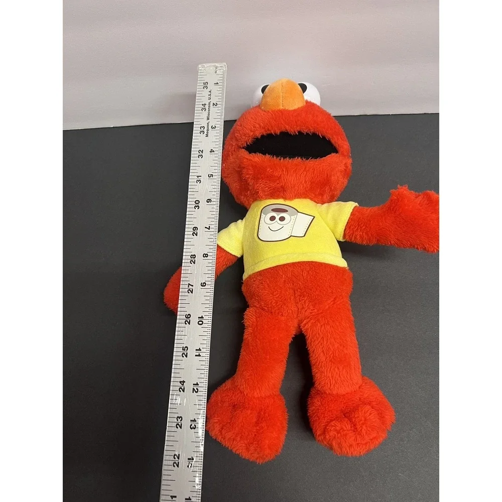 Sesame Street‎ Potty Elmo Toy Plush Talks Sings - works great